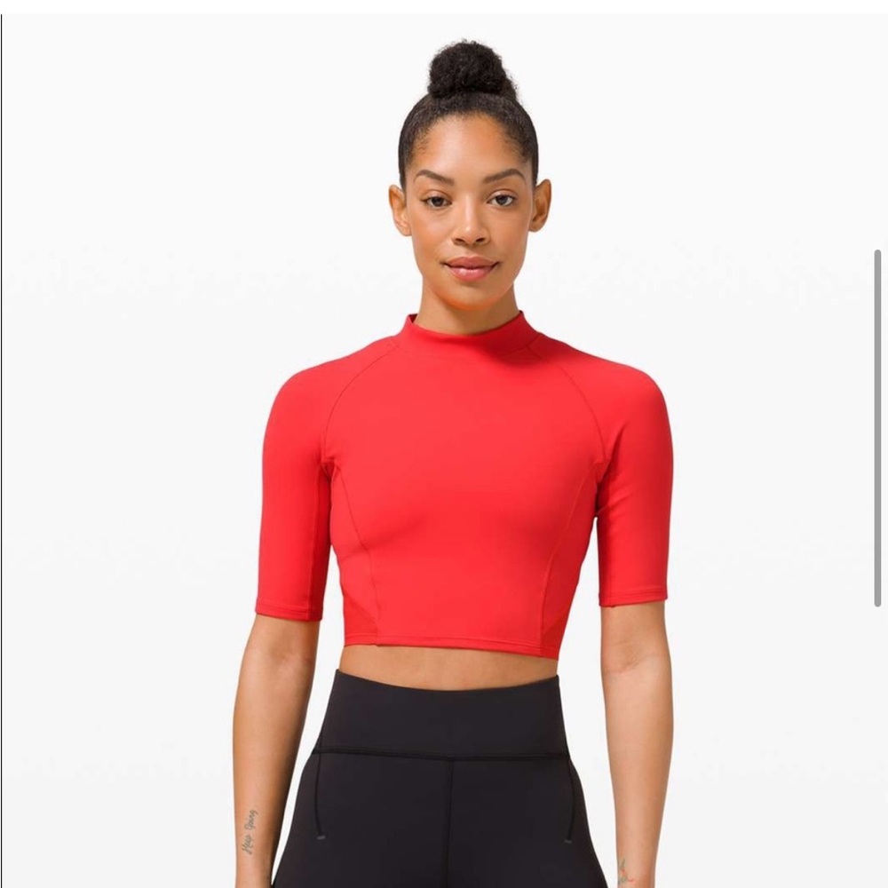 Lululemon Everlux and Mesh Cropped
Short Sleeve Pink Punch Size 4